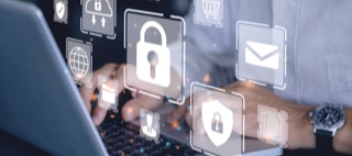 Notebook mit Programmsymbolen